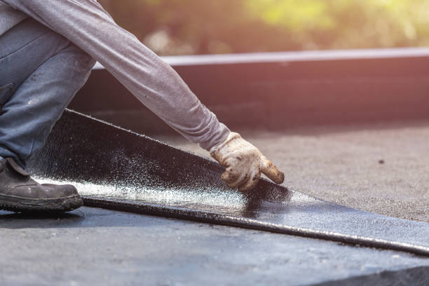 Professional Basement Waterproofing technician working in Carrollton, OH